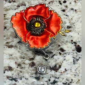 Flower badge reel. Badge pull.